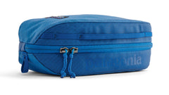 Patagonia Black Hole Cube 3L Endless Blue serves as a durable travel dopp kit with recycled materials.