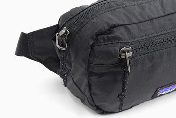 Patagonia Ultralight Black Hole Mini Hip Pack compact storage stowable in larger bags