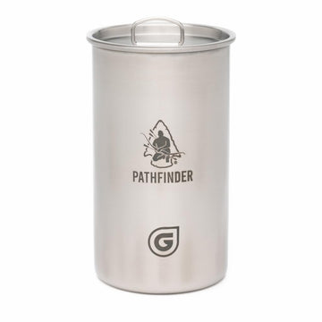 The Pathfinder School Geopress Nesting Cup with lid on for efficient camp cooking.