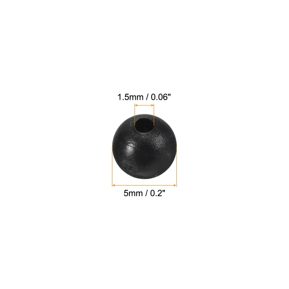 Close-up of PATIKIL black round beads on a line, improving lure visibility.