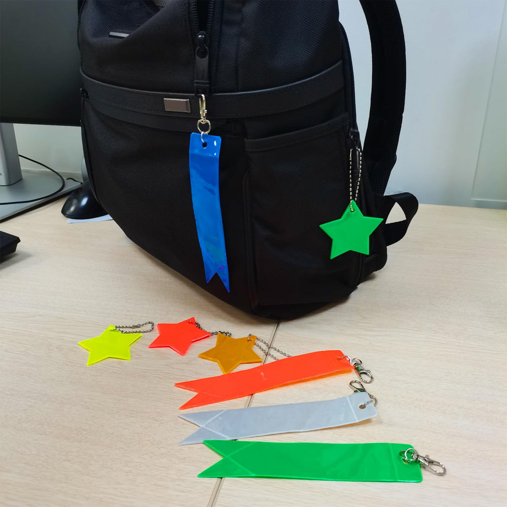 PATIKIL reflective pendant on a wheelchair for nighttime visibility and safety.
