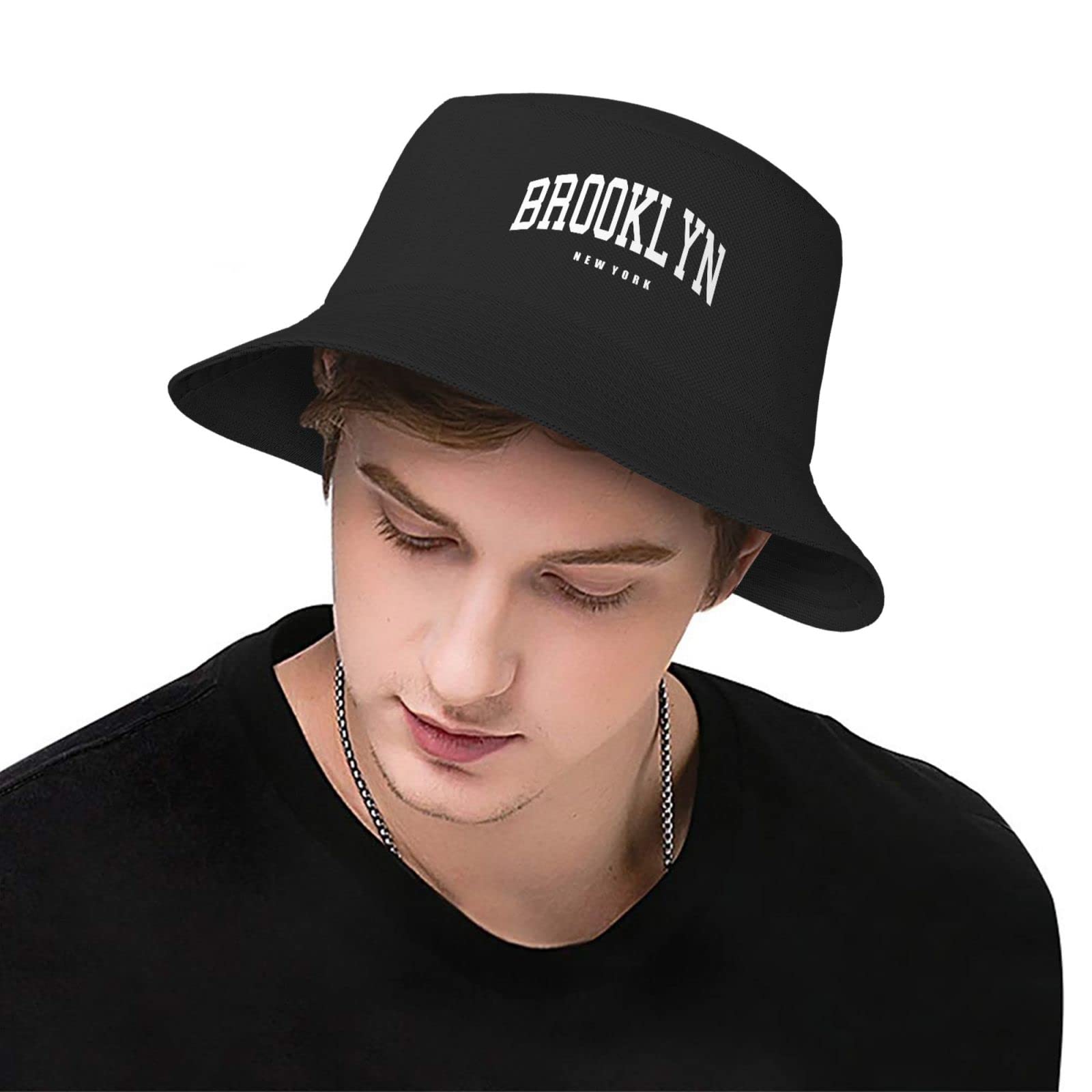 PAUPPY Vintage Brooklyn bucket hat shields from sun during outdoor activities.
