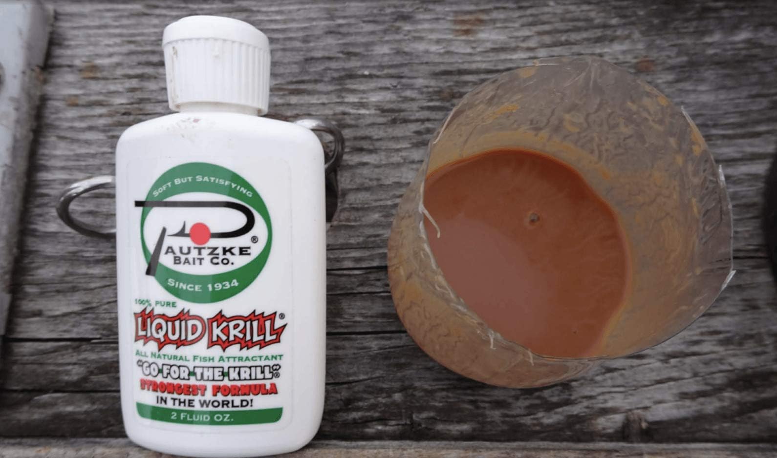Pautzke Liquid Krill bottle cap off shows easy dispensing for fast bait prep.