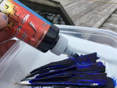 Assorted live bait dyes including chartreuse, red, blue and gold