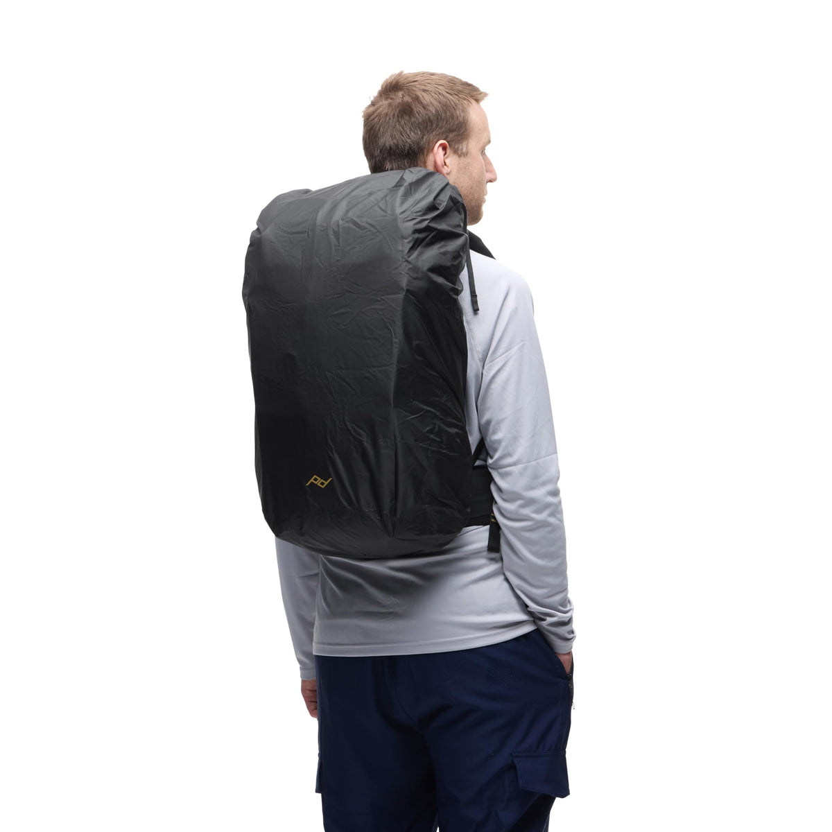 Peak Design Outdoor Rain Fly over a 45L backpack for rain protection