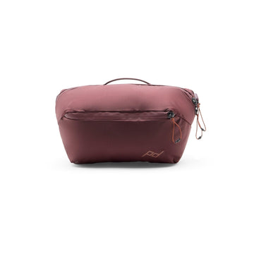Peak Design Outdoor Sling 2L Eclipse strapped for comfortable crossbody wear