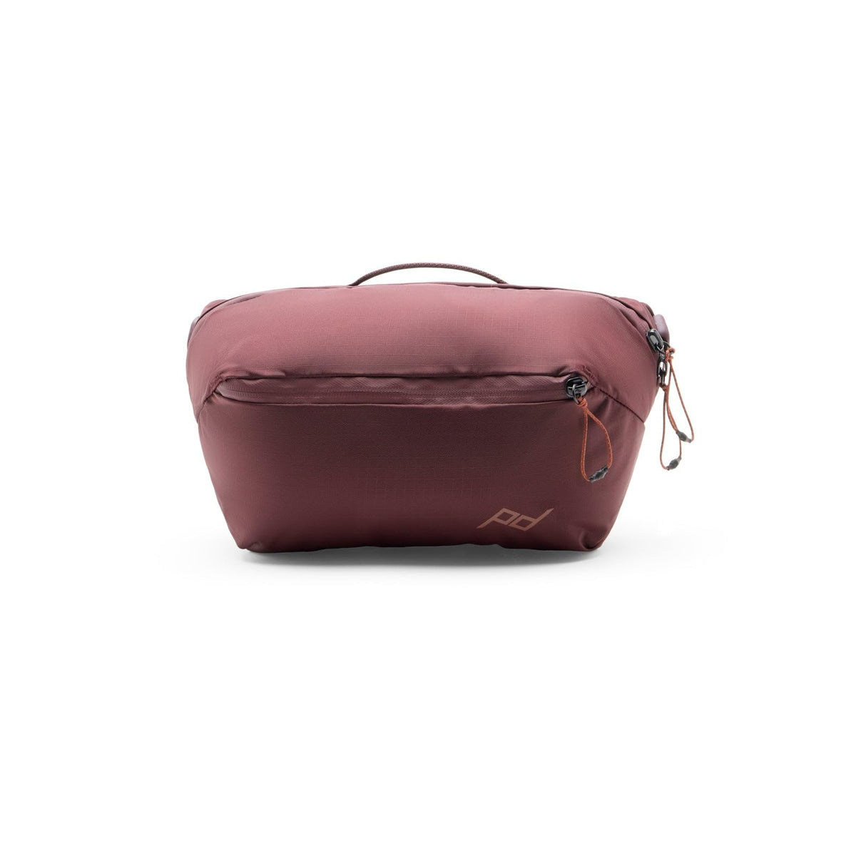 Peak Design Outdoor Sling 2L Eclipse strapped for comfortable crossbody wear