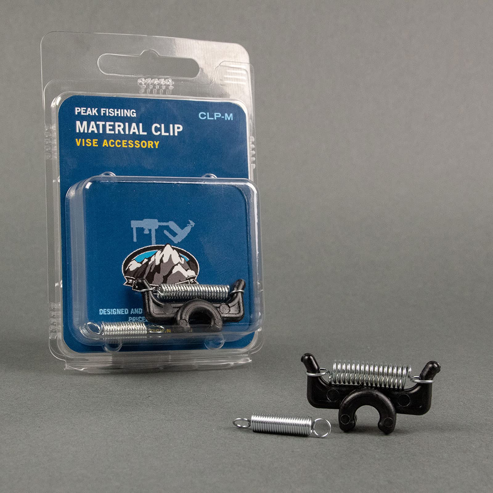Material Clip attached to a 1/4 inch diameter shaft