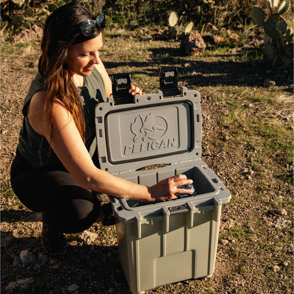 Pelican Elite 20qt cement-white tie-down slots for secure vehicle mounting.