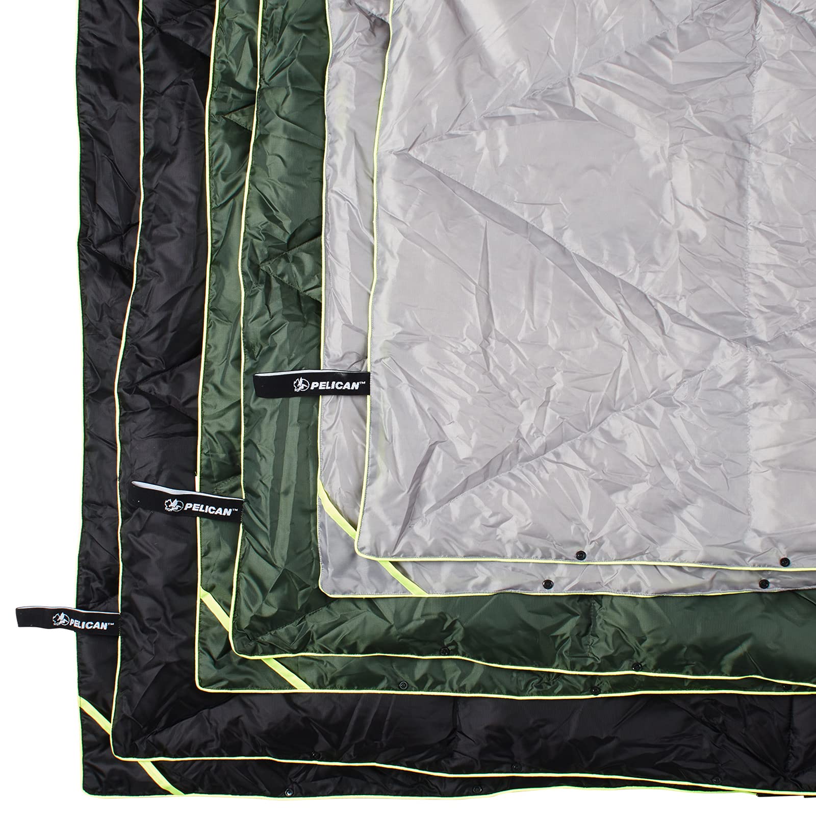 Pelican Woobie water-resistant shell demonstrated during light rain and rugged outdoor use.
