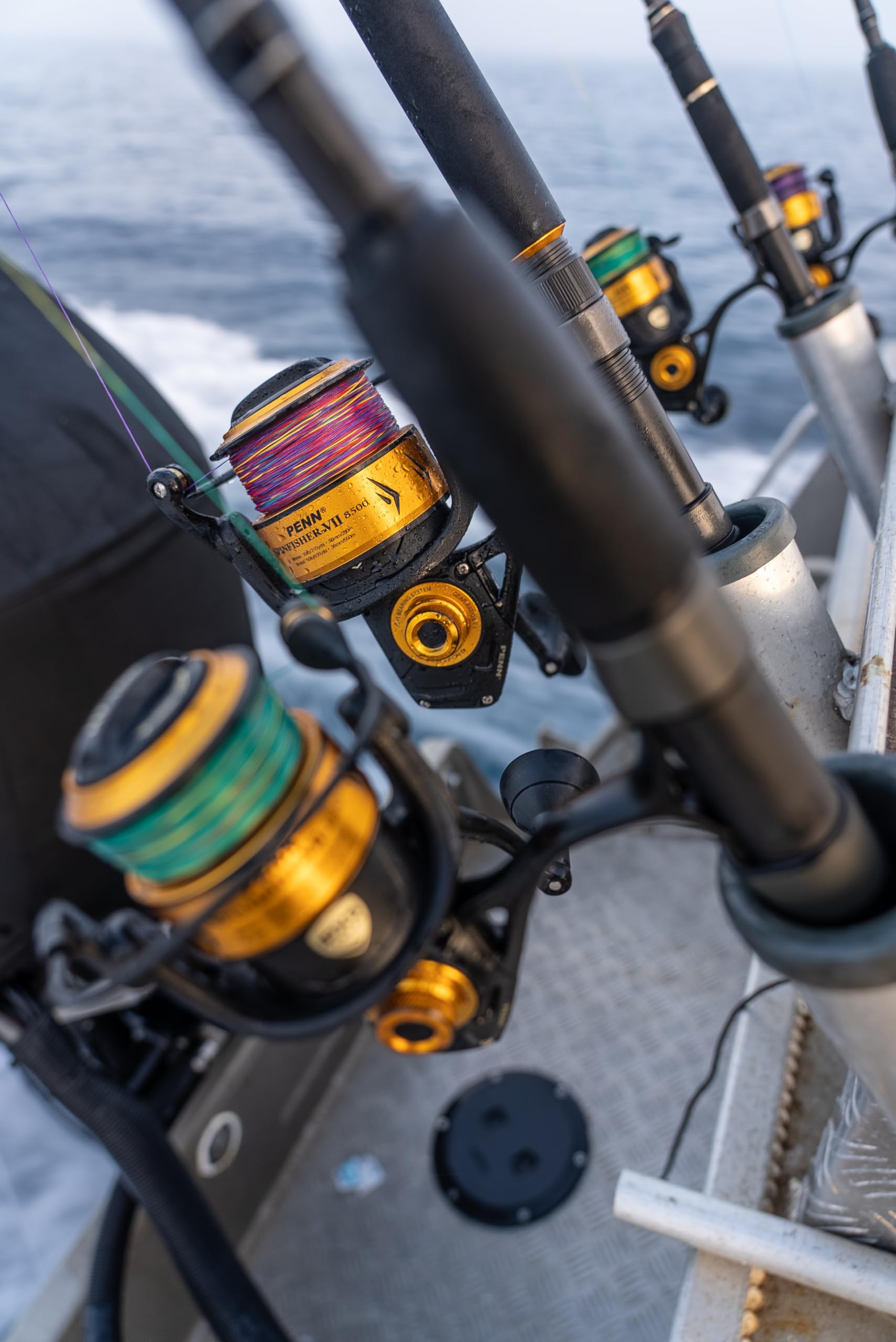PENN Spinfisher VII handle-position shows bidirectional use for ambidextrous comfort.