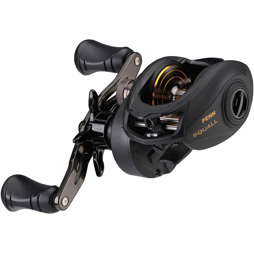 PENN Squall Low Profile Reel Black Smoke in-hand image emphasizes ergonomic grip for long sessions