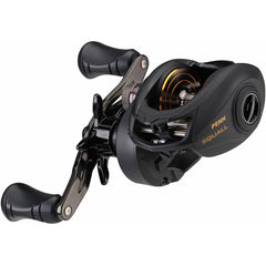 PENN Squall Low Profile Reel Black Smoke in-hand image emphasizes ergonomic grip for long sessions