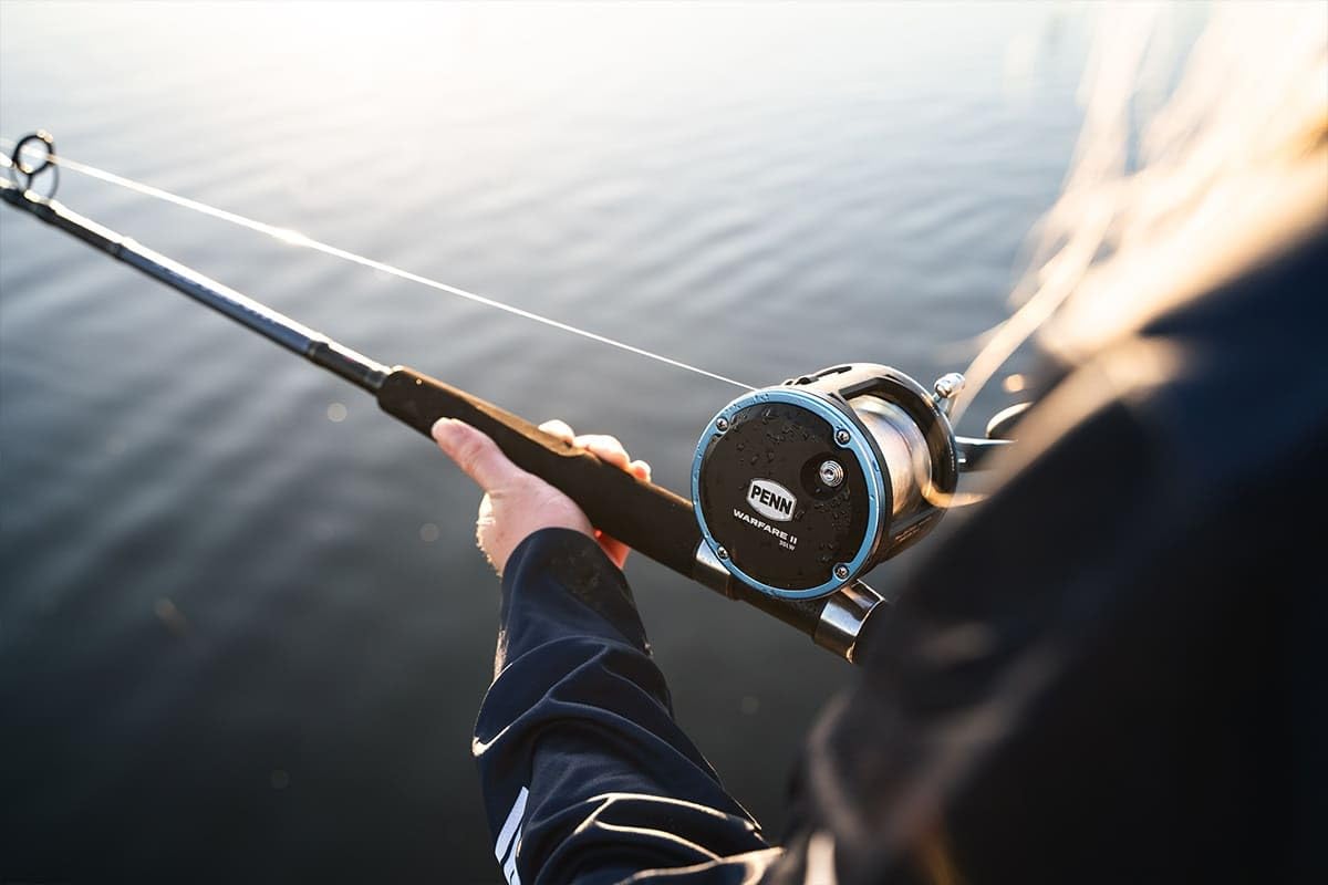 PENN Warfare II brass-main-gear provides steady power and durability.