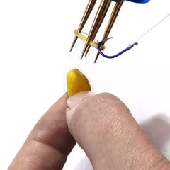 Peosaard Pellet Bander in use showing quick three-second bait attachment.
