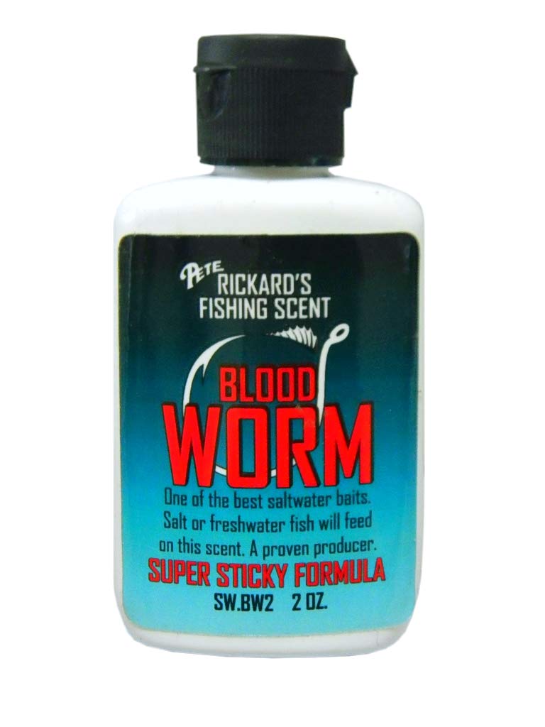 Close-up of blood worm scent being applied to fishing lure