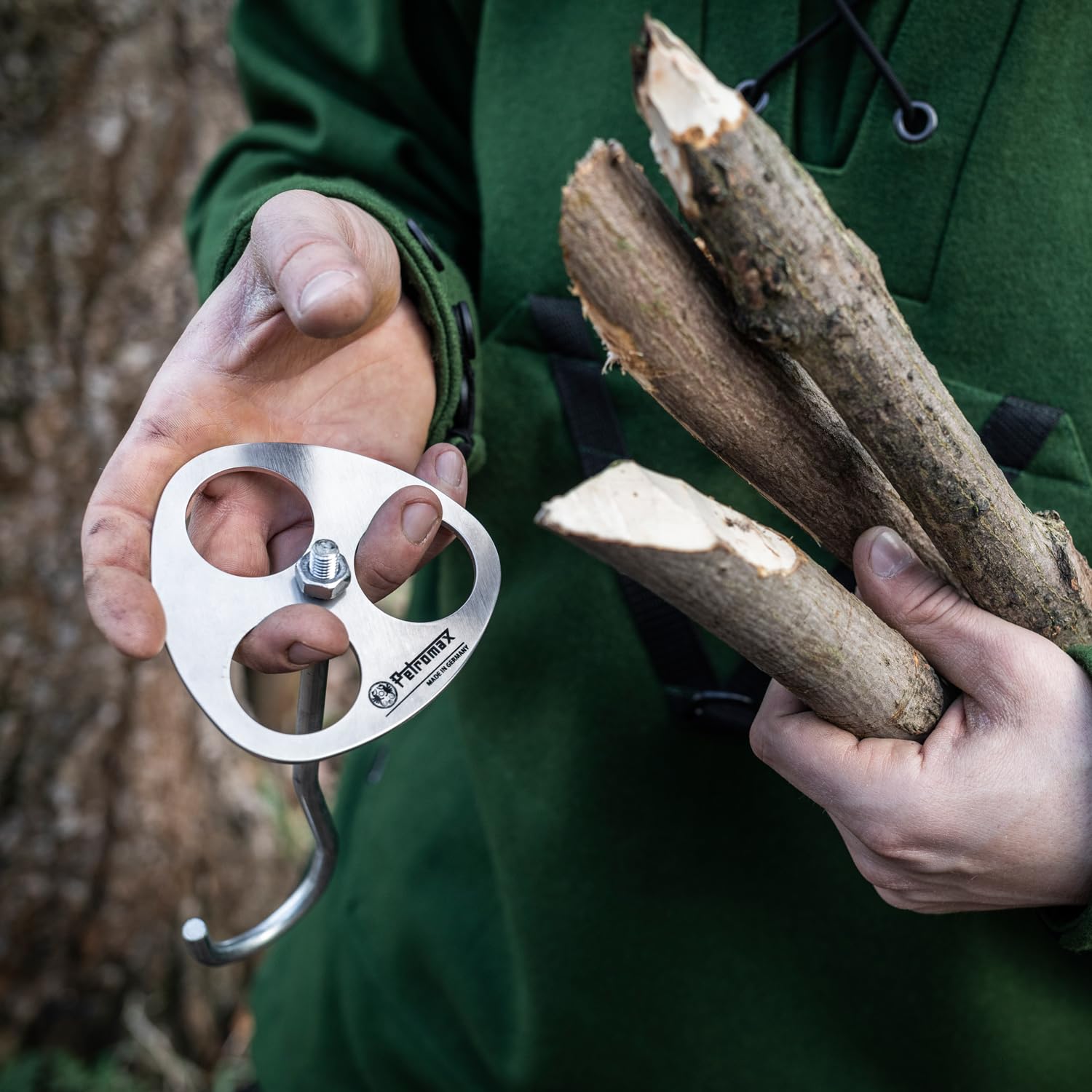 Petromax bushcraft tool aids independent outdoor cooking and shelter-building.