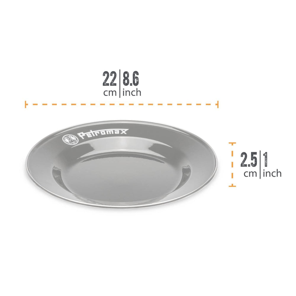 Petromax enamelware plate on a camping table with a black finish for outdoor meals