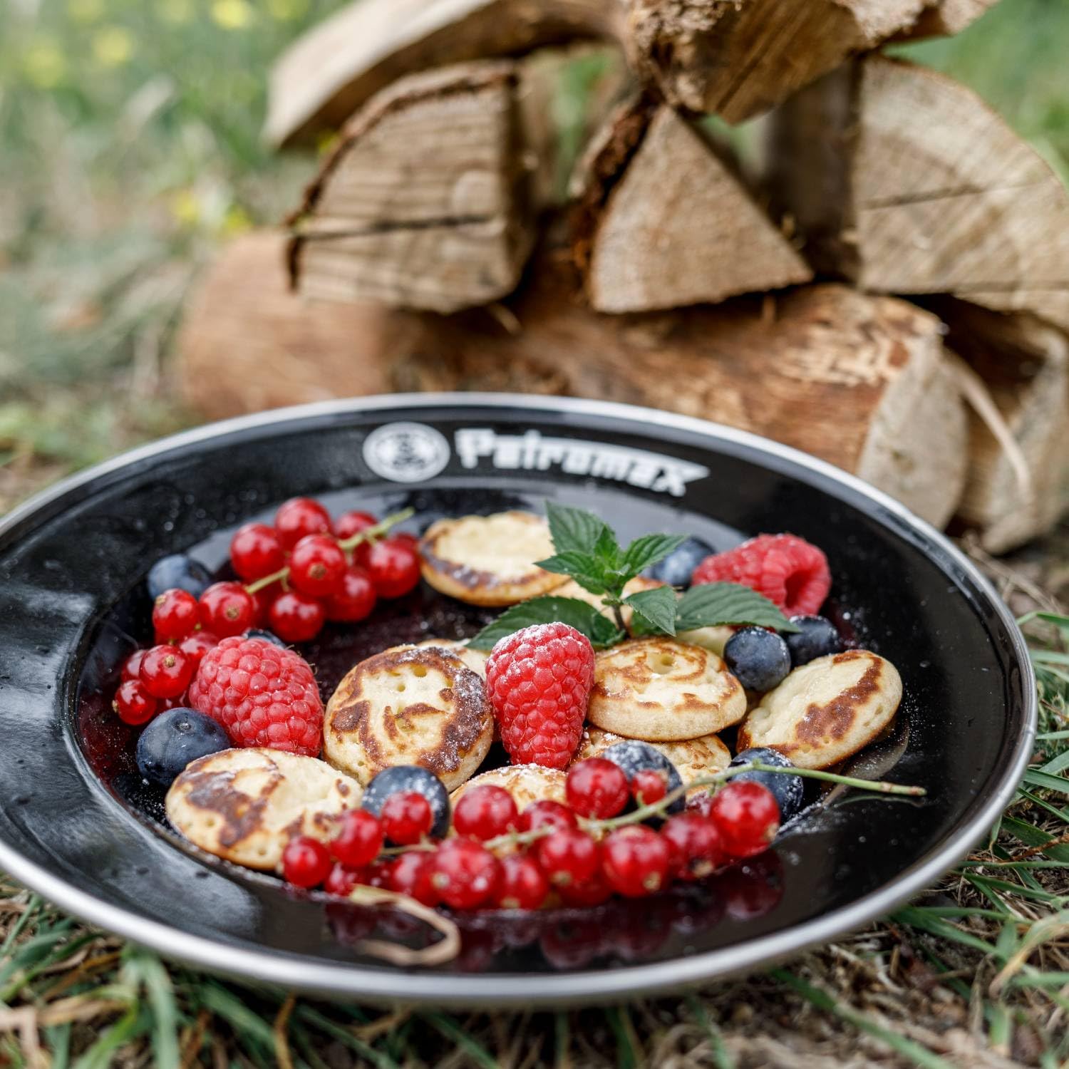Petromax lightweight enamel plate ideal for camping, picnics, and travel