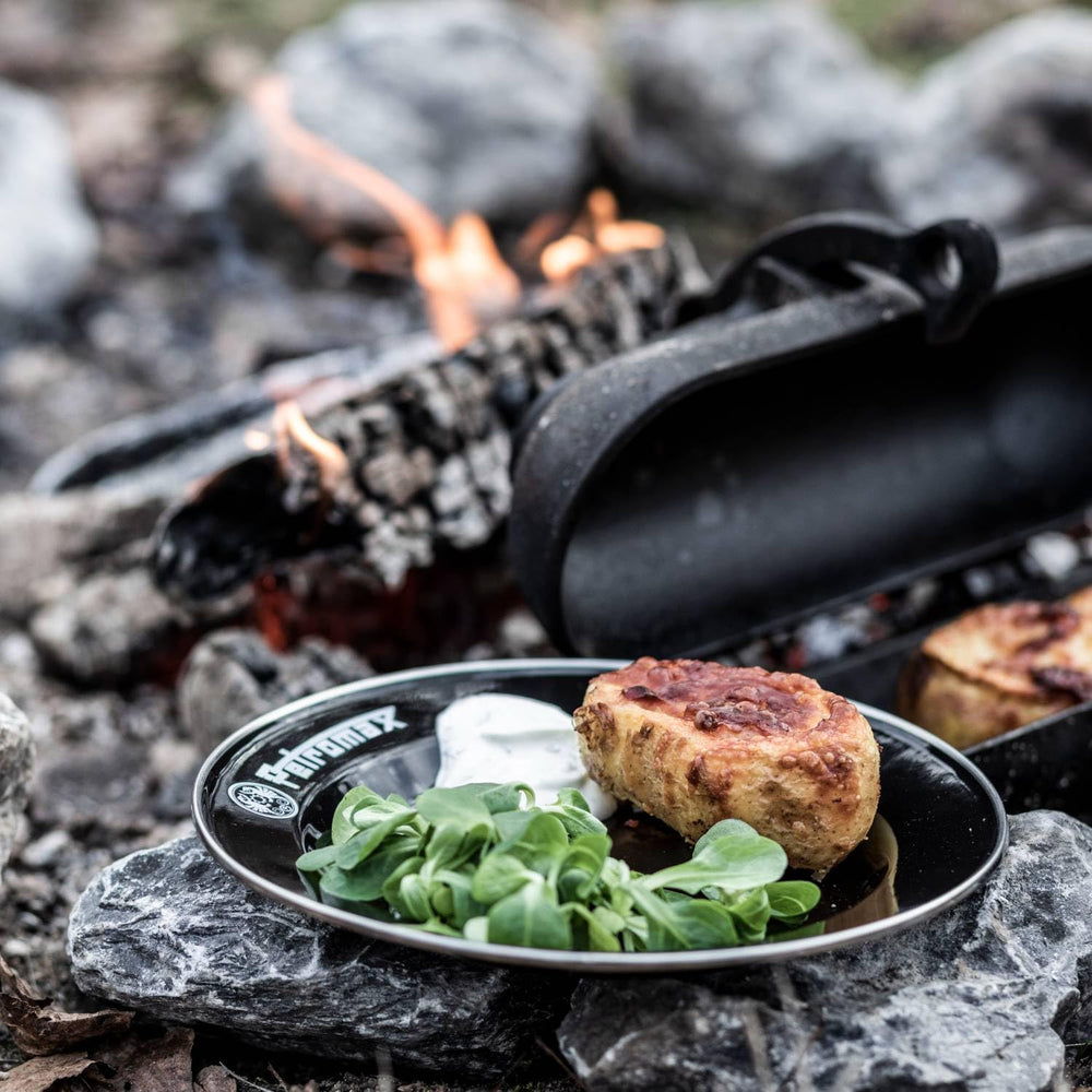 Petromax enamelware plate features lightweight design for effortless on-the-go dining.