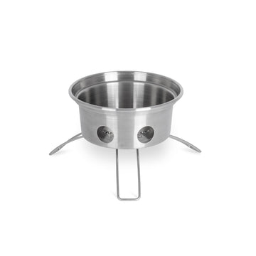 Petromax Fire Kettle silicone handles protecting hands during pouring