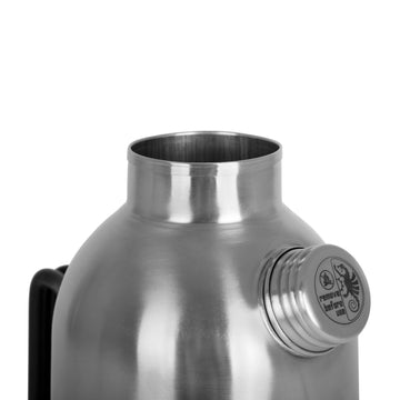 Petromax Fire Kettle used with small pots for versatile meals outdoors.