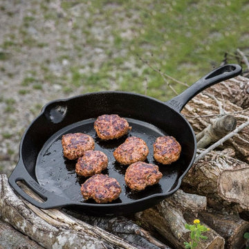 Petromax 12-inch skillet long-handle design enables safer outdoor cooking