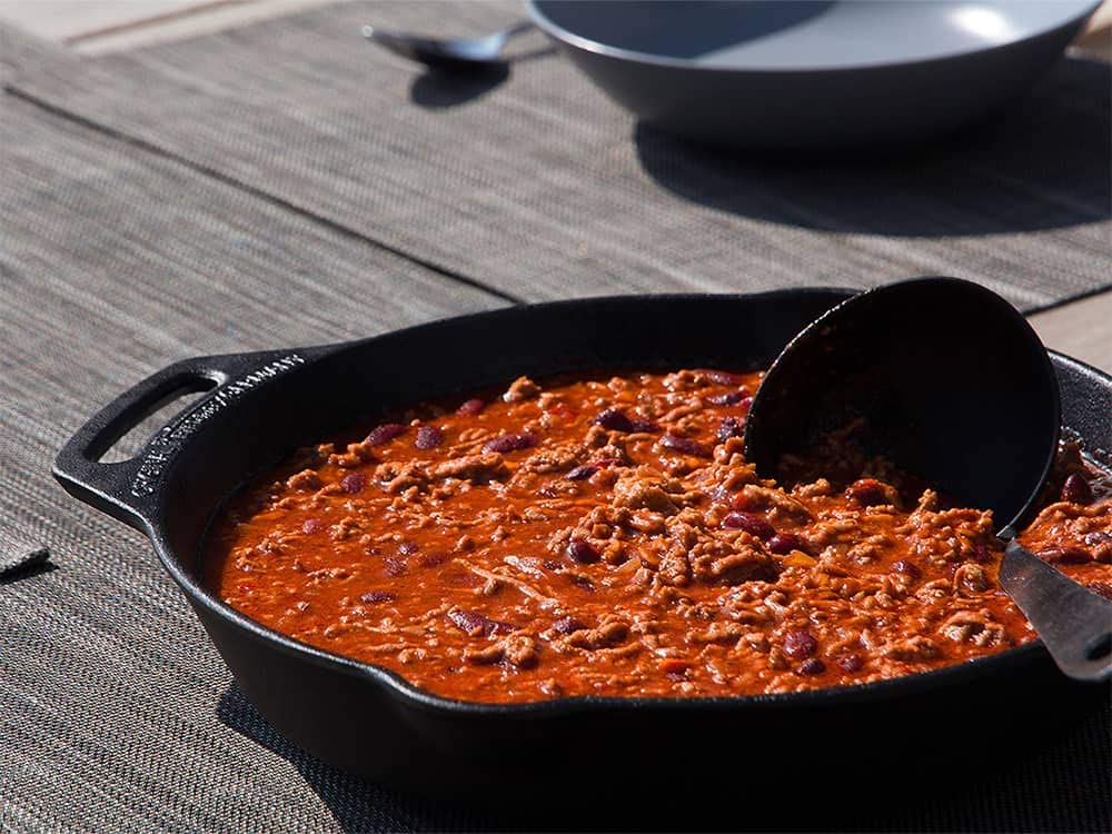 Petromax 8-inch skillet, seasoning close-up shows natural patina forming.