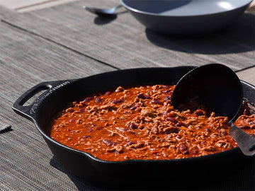 Petromax 8-inch skillet, seasoning close-up shows natural patina forming.