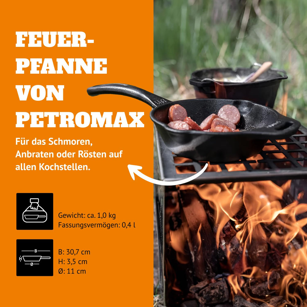 Petromax fire skillet outdoors over campfire, highlighting versatility.