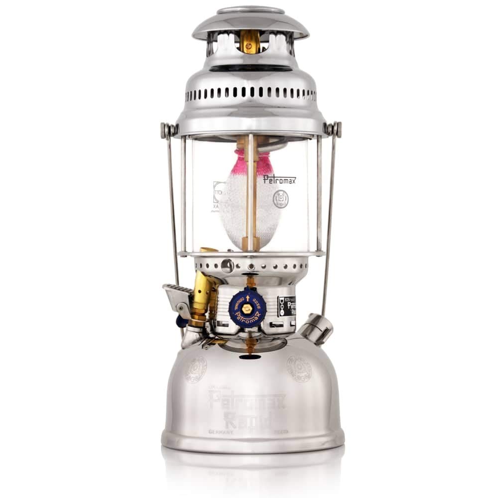 Petromax HK500 lantern fully assembled on a camping table, bright light for camping and emergencies