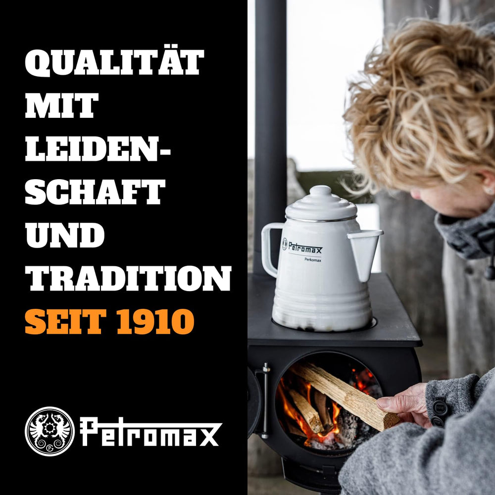 Petromax percolator on barbecue grill for smoky outdoor brews.