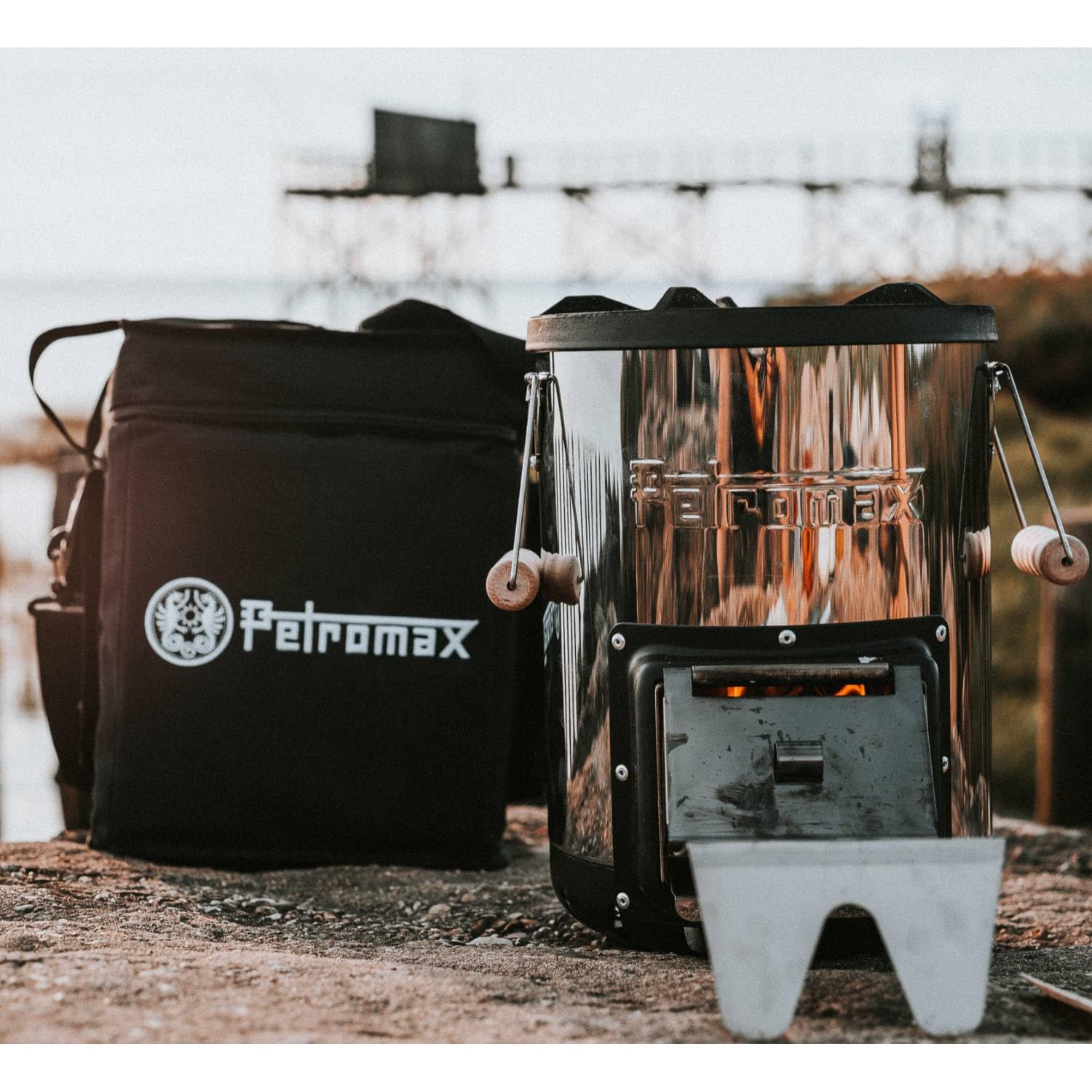 Petromax Rocket Stove Bag demonstrates secure fit for Rocket Compact Outdoor Stove during travel.