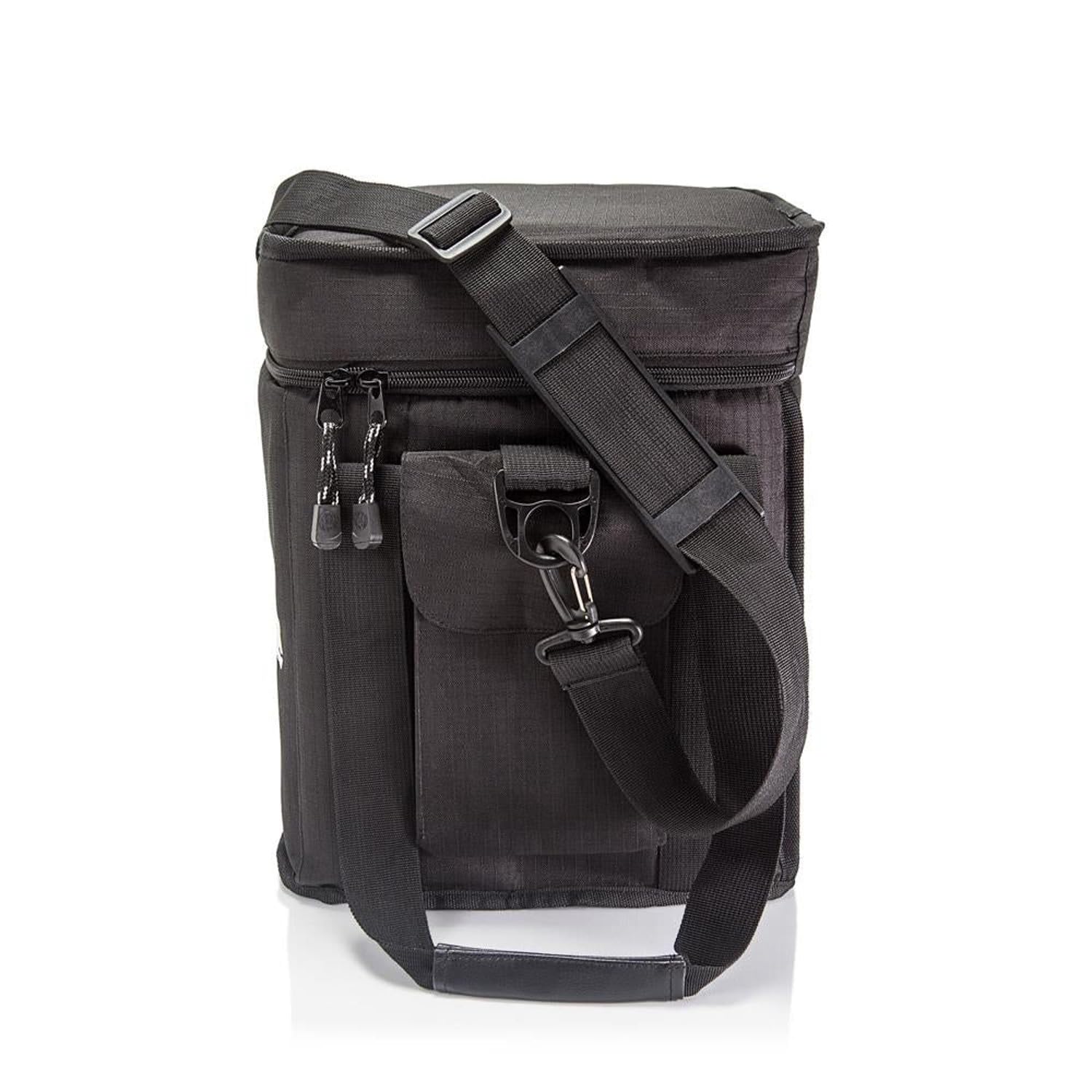 Inside view of Petromax Rocket Stove Bag with mesh pockets for accessories organization.