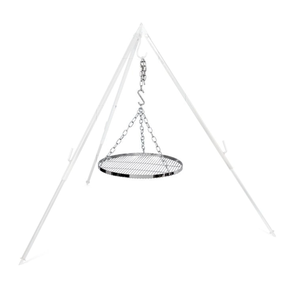 Petromax steel chains and grate swinging to gently cook over fire.