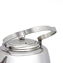 Petromax teakettle with movable threefold handle for hanging over fire.