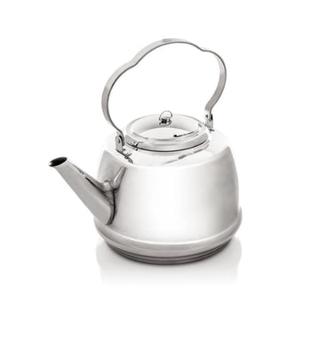 Petromax teakettle over an open fire for fast boiling and aroma-rich tea
