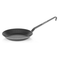 Petromax wrought iron skillet long-handle close-up shows sturdy grip and even heating potential.