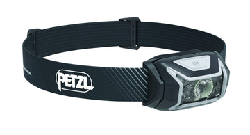 Petzl Actik Core headlamp front view with bright beam for outdoor adventures.