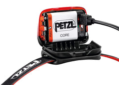 Petzl Actik Core red light activation shows night-vision preservation for early starts.