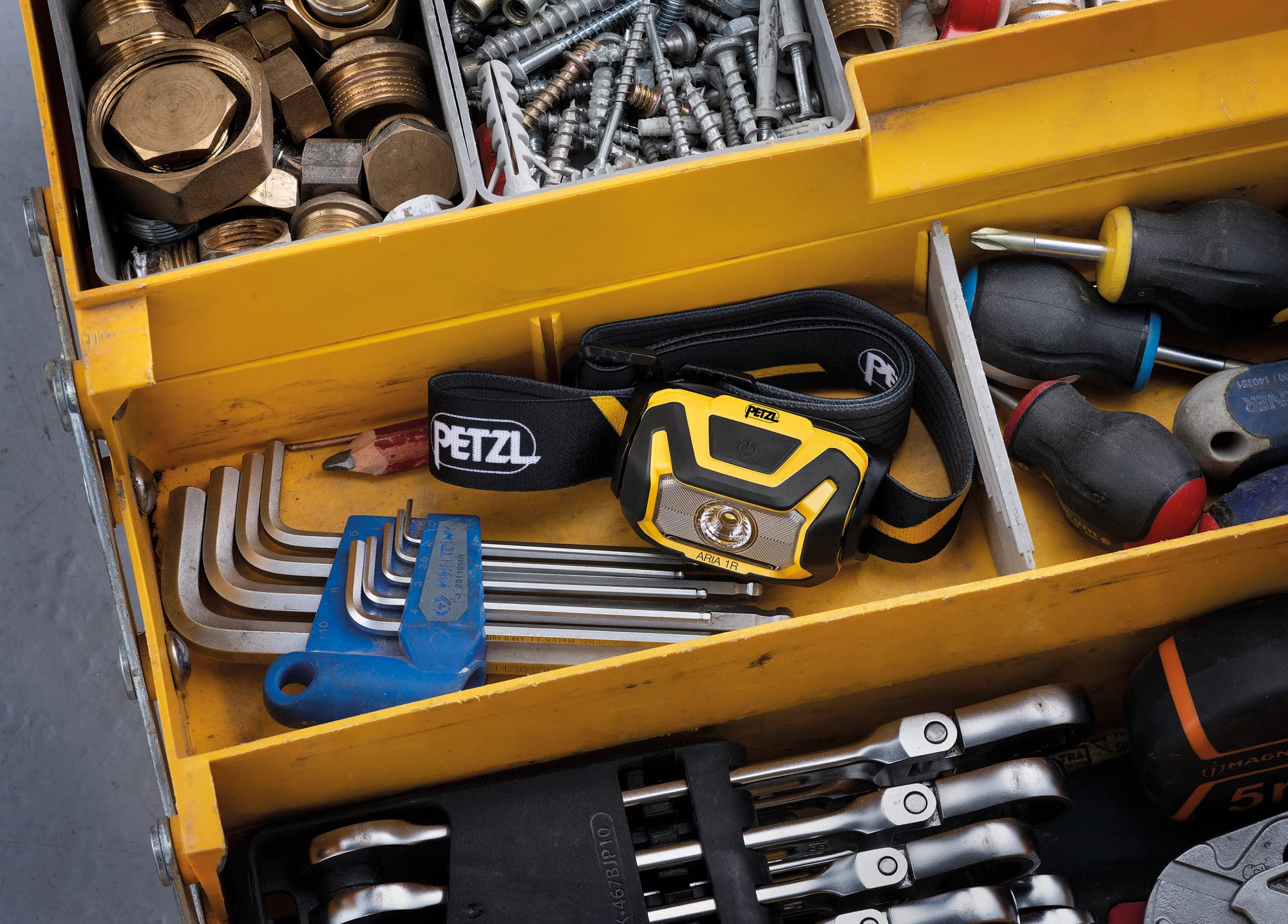 PETZL ARIA 1R charging with CORE USB-C battery for frequent use