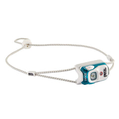 Petzl Bindi headlamp emerald front view shows compact wearable design for all-day use.