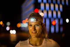 Petzl Bindi emerald headlamp recharge indicator highlights power awareness.
