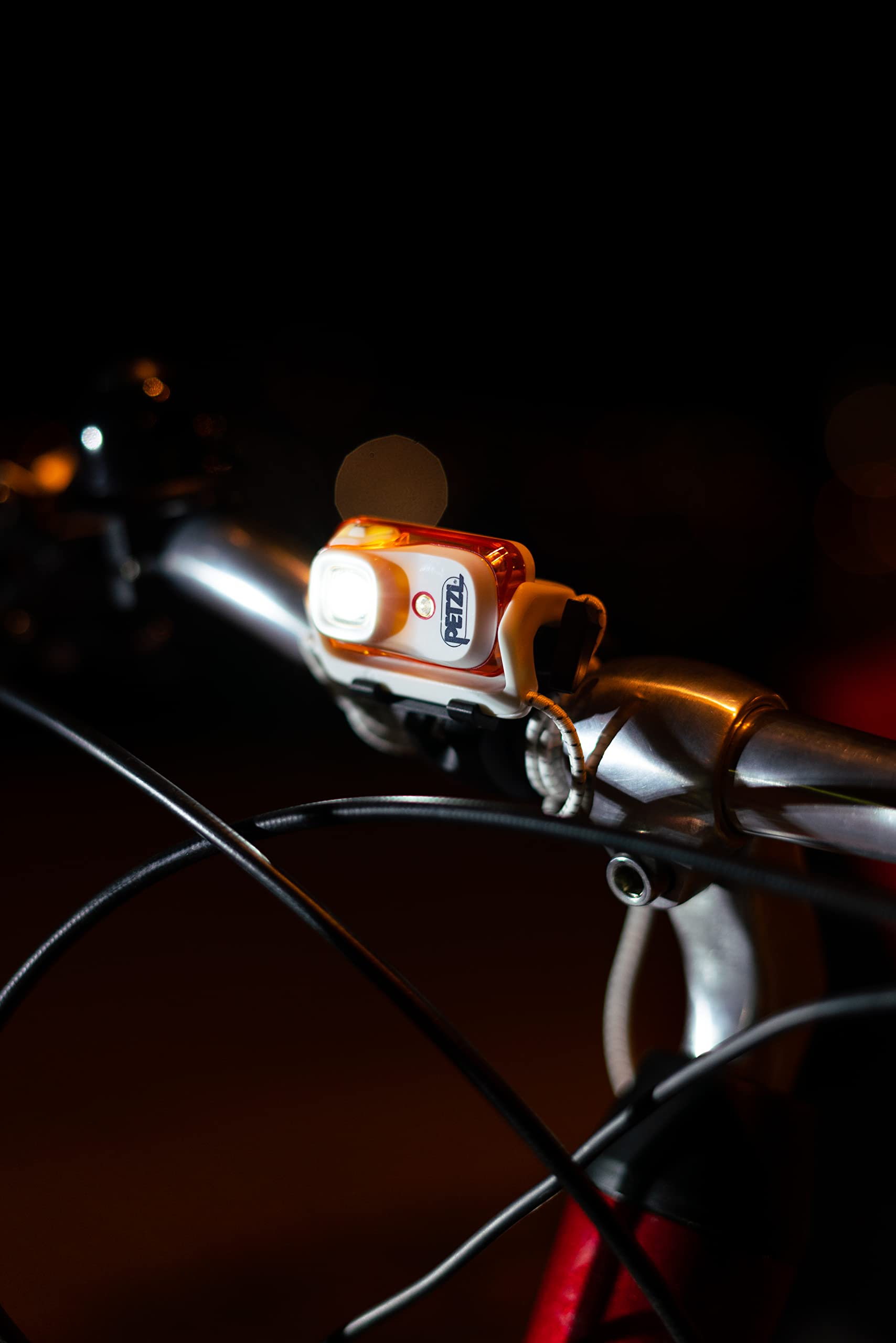 Petzl Bindi movement mode supports pace-aware beam during runs.