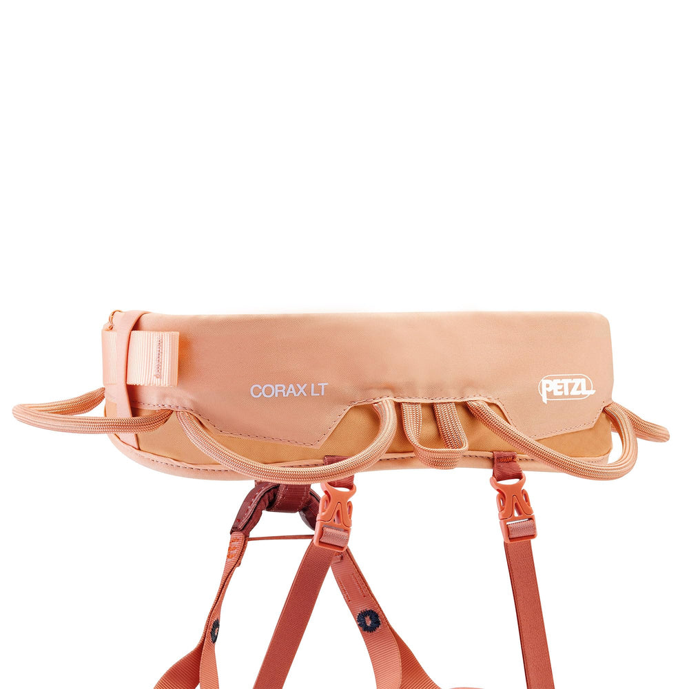 Elasticized leg loops on Petzl Corax LT adapt to thighs for comfort.