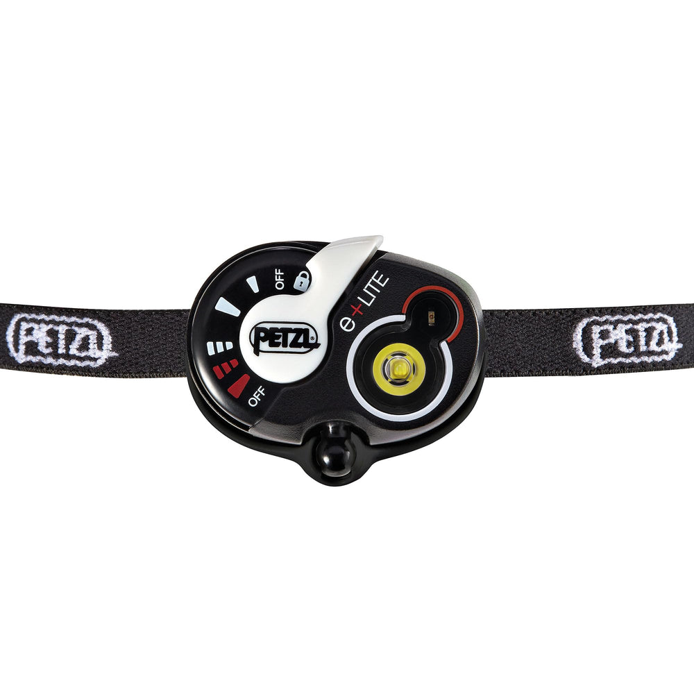 Petzl e+LITE locking switch close-up for accidental-activation protection