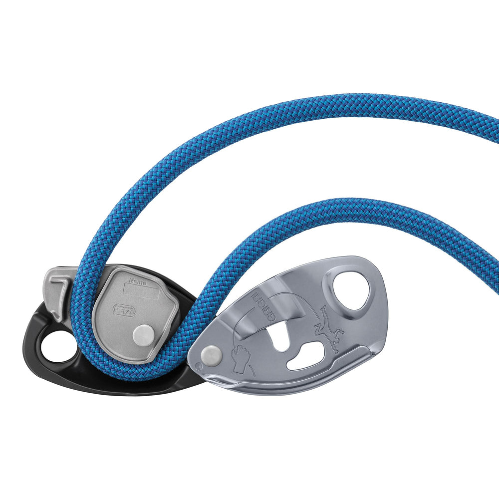 PETZL Grigri gray ergonomic handle close-up for easy rope lowering control.