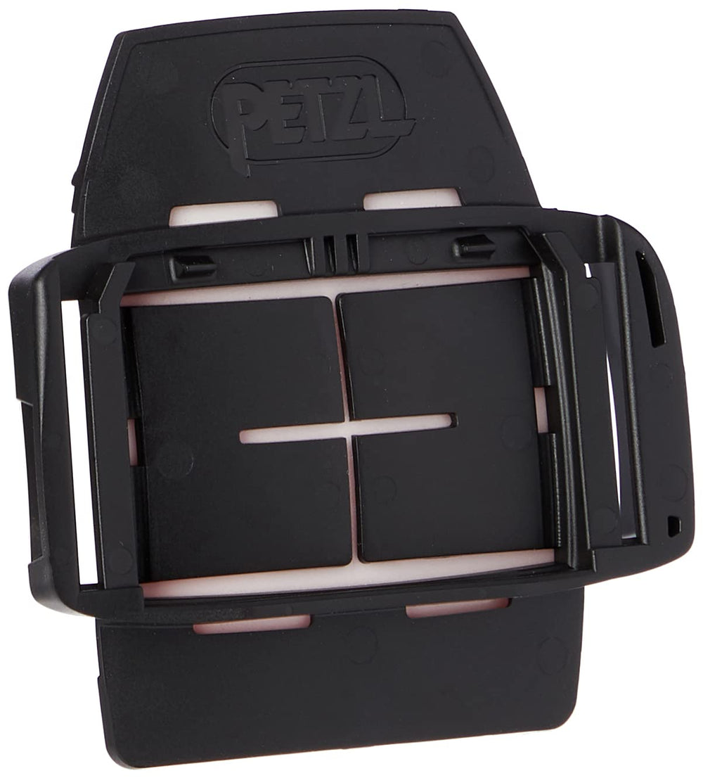 Petzl Pixadapt connection plate mounts on a helmet for secure headlamp setup