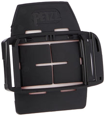 Petzl Pixadapt connection plate mounts on a helmet for secure headlamp setup