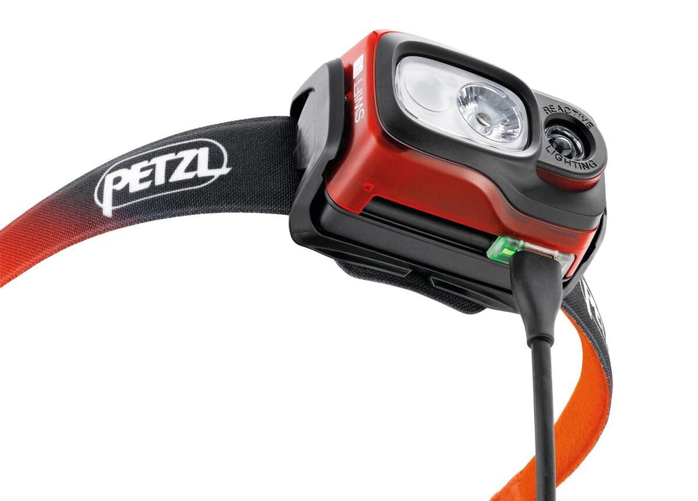 Petzl Swift RL red-light option preserves night vision for reading and quiet tasks.